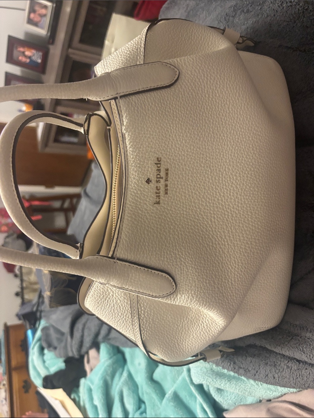 kate spade cream pebbled leather satchel with gold logo